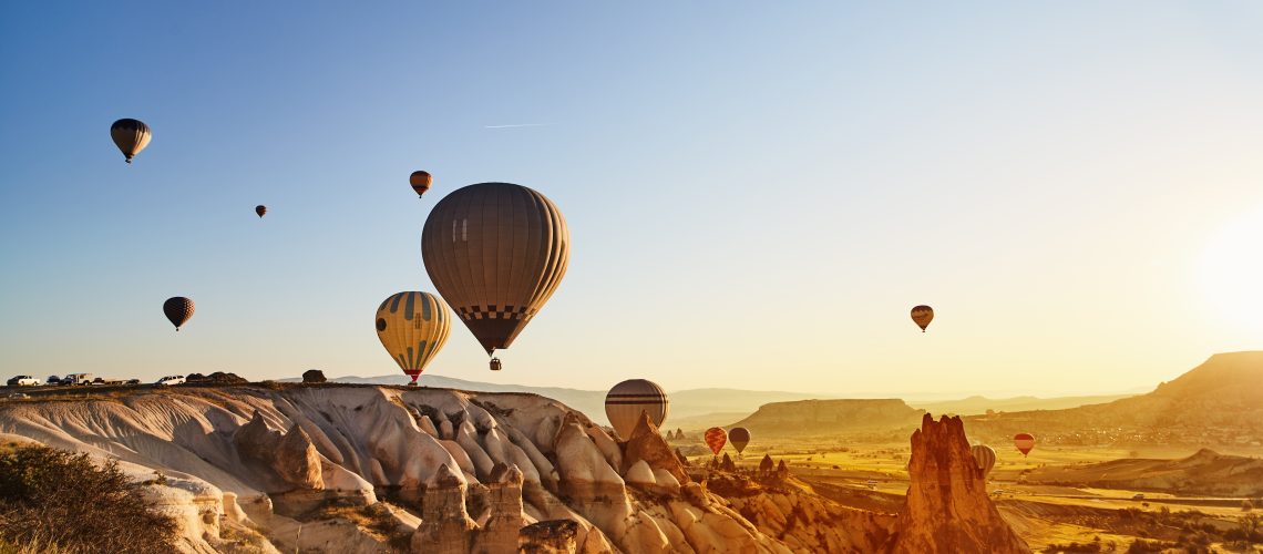 Hot Air Balloons Flying at Sunset, Cappadocia, Turkey